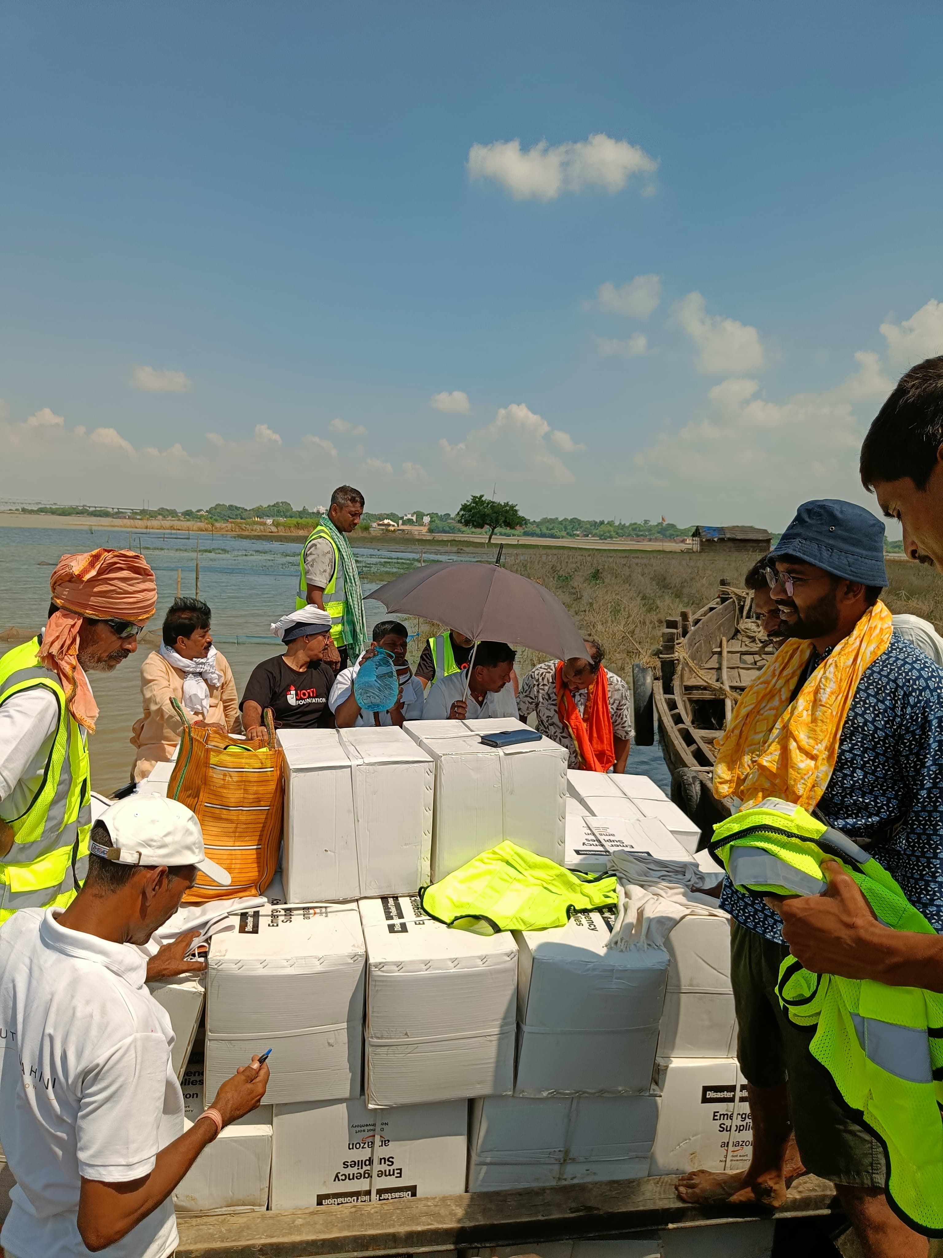 Boat mission supplying flood-affected villages in Bihar